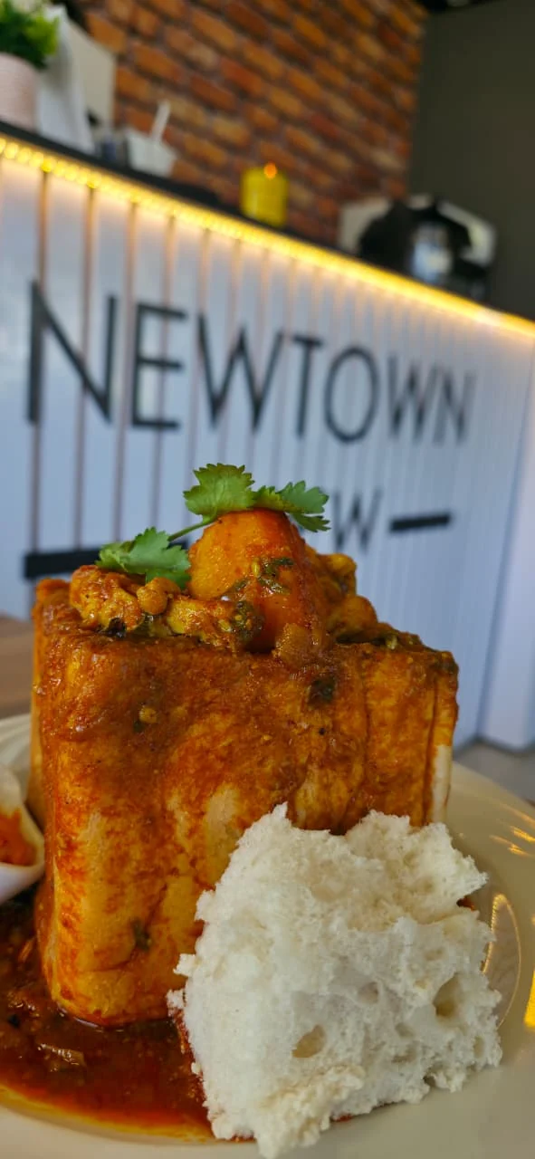 Curry and rice served at NewTown Brew